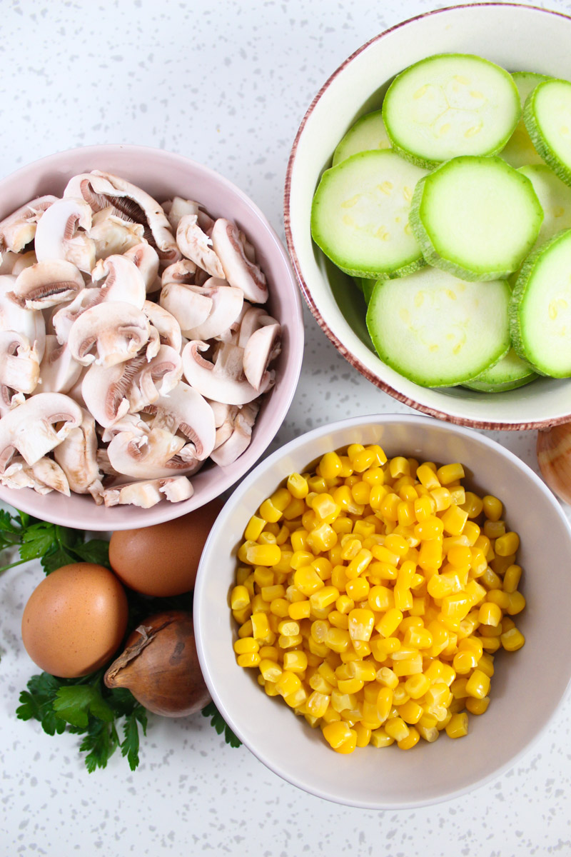 Ingredients for zuchini pie with sweet corn