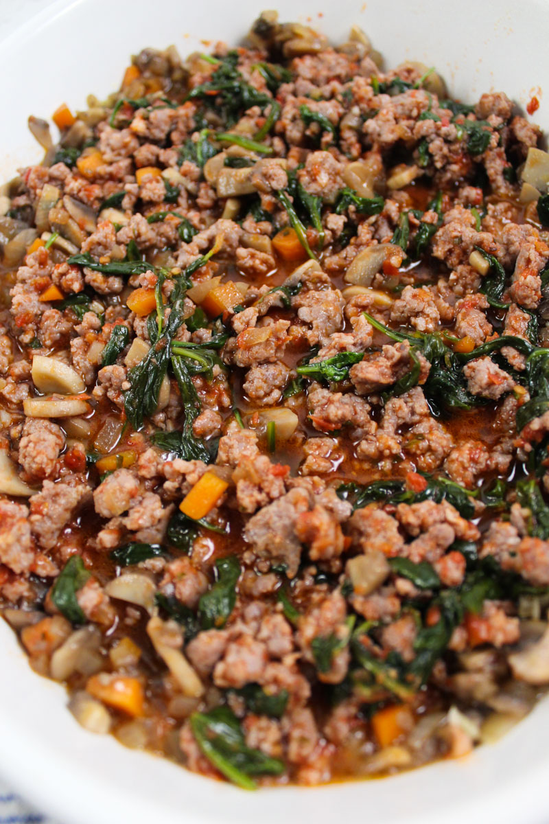 This Italian Sausage and Spinach Casserole is Paleo-friendly, a dinnertime wonder that will please your whole family.