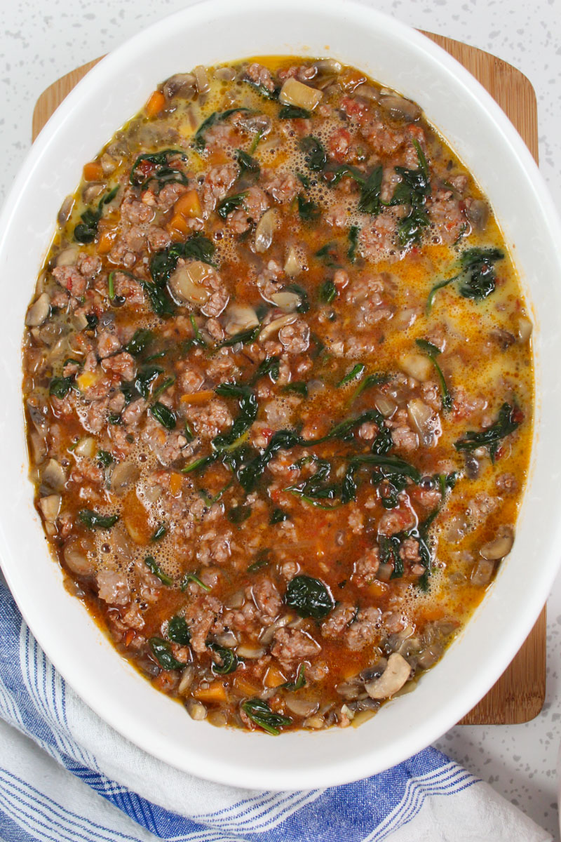 This Italian Sausage and Spinach Casserole is Paleo-friendly, a dinnertime wonder that will please your whole family.