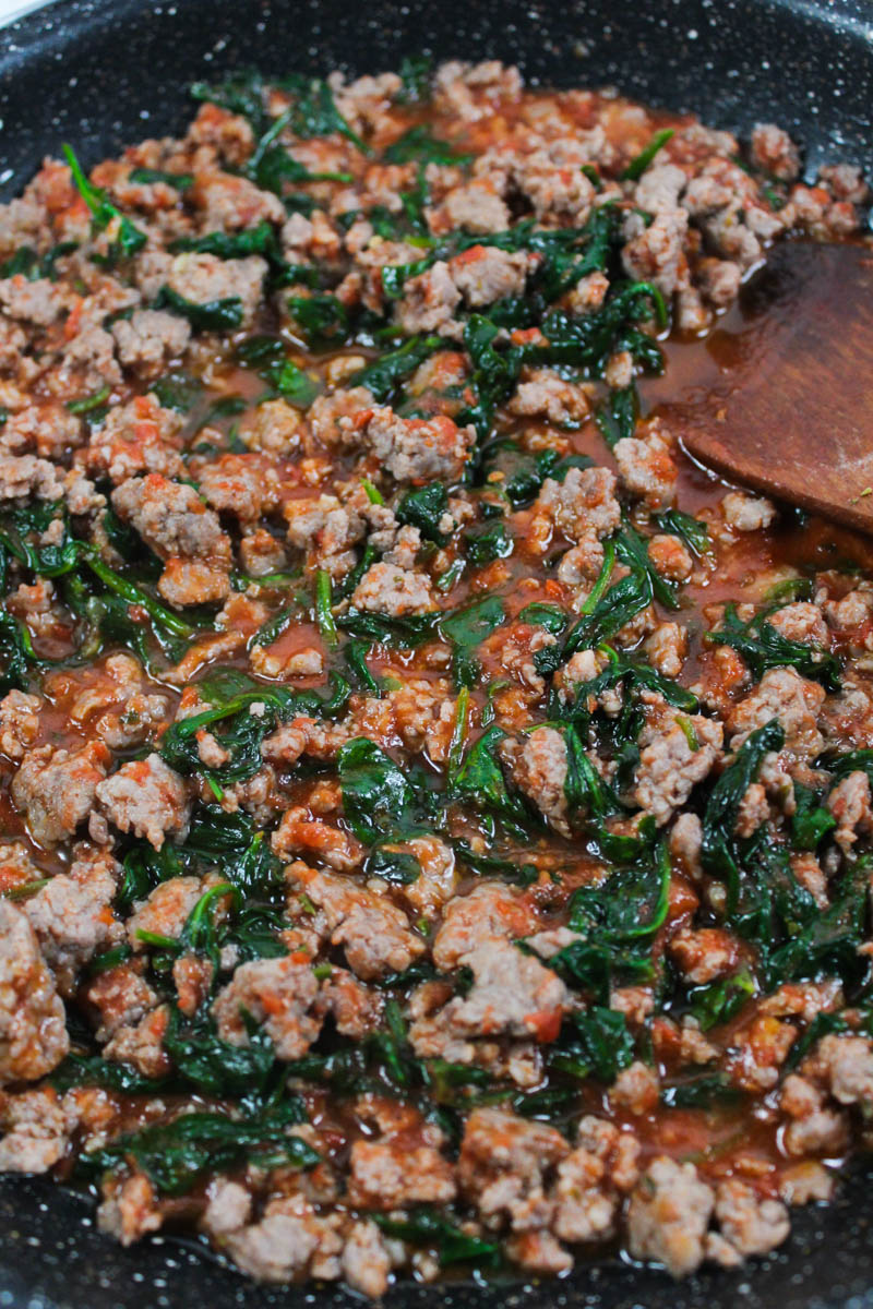 This Italian Sausage and Spinach Casserole is Paleo-friendly, a dinnertime wonder that will please your whole family.